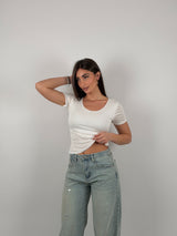 Maglia semivelata con scollo tondo e mezza manica