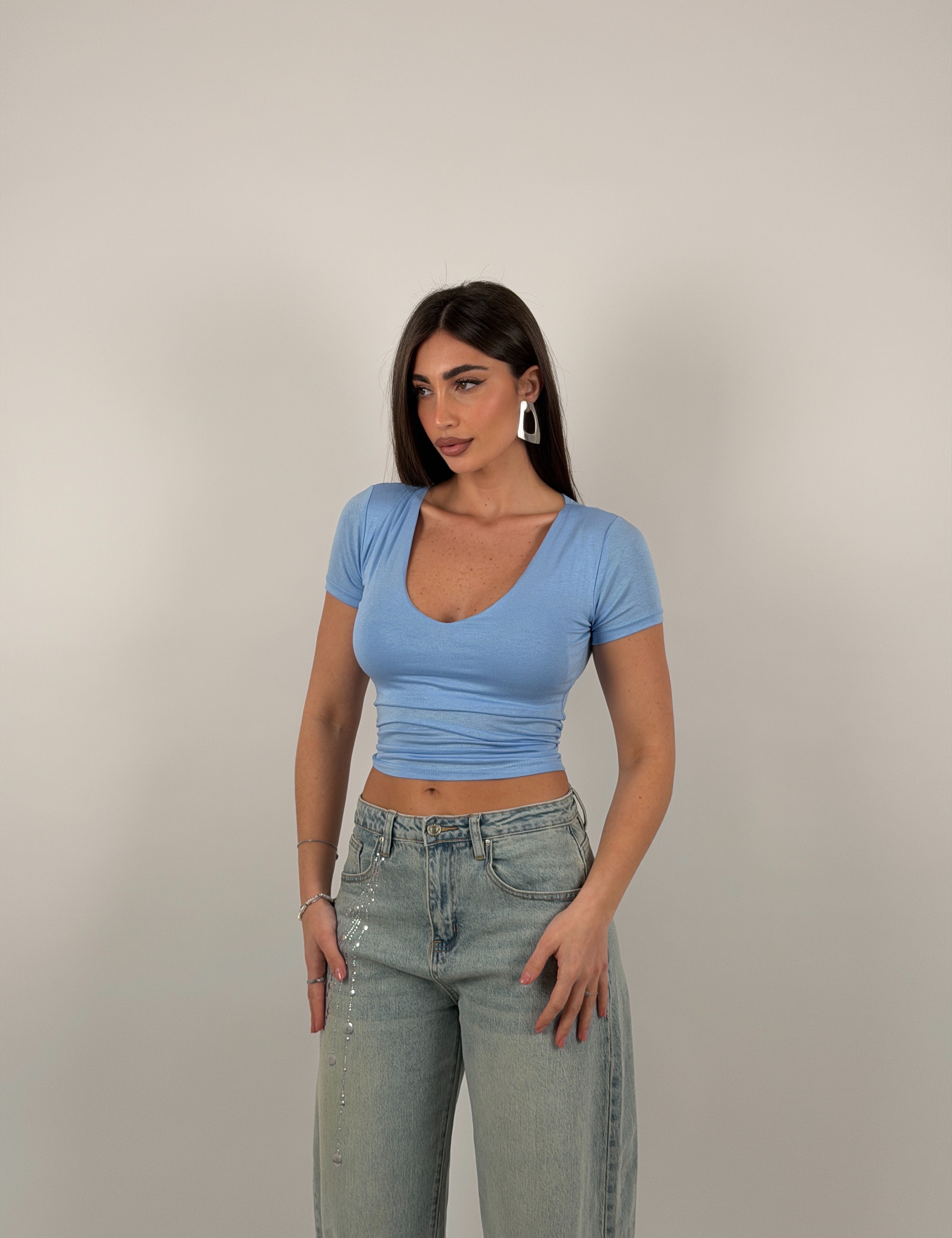 Maglia scollo a V semivelata mezza manica