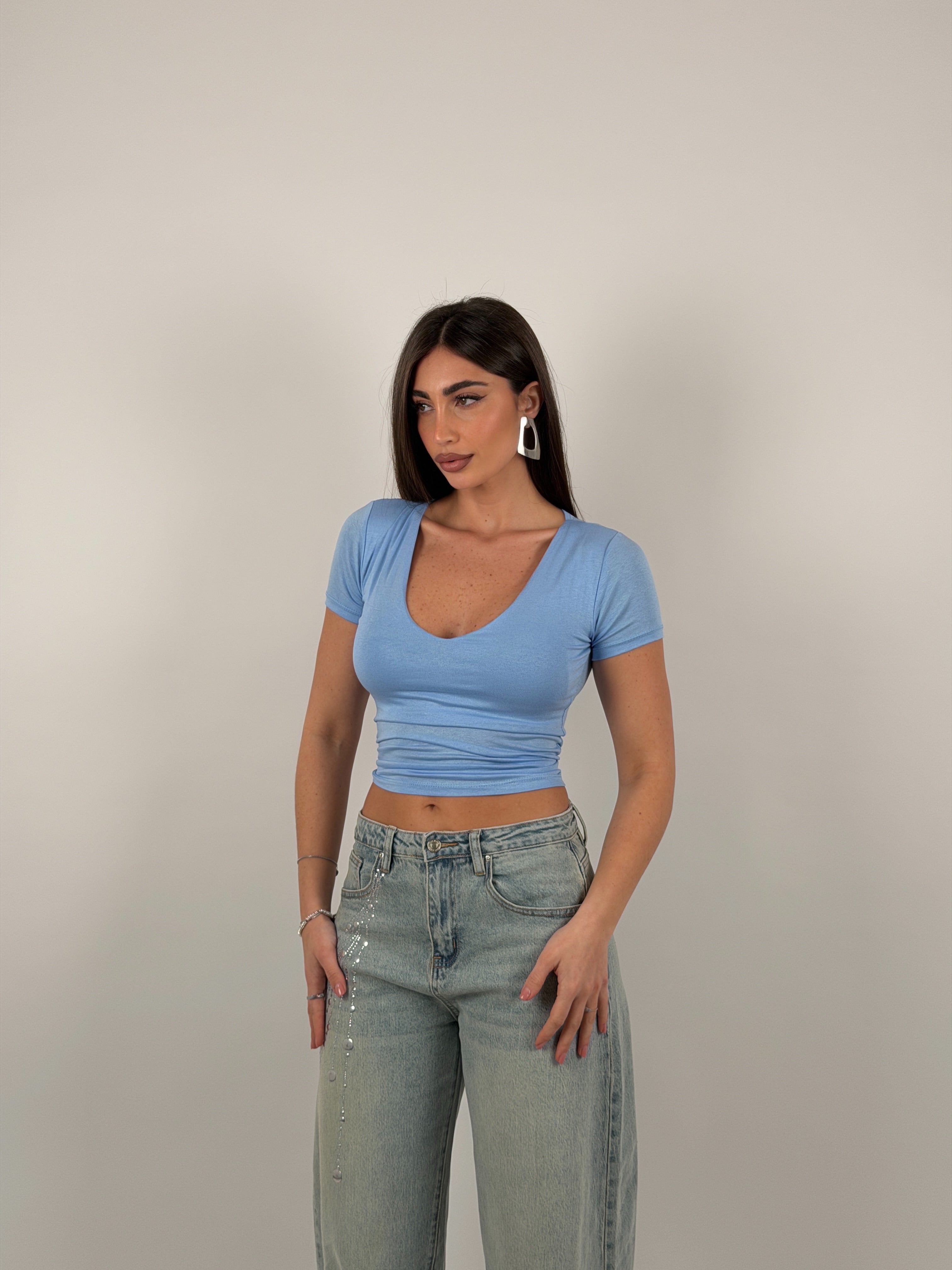 Maglia scollo a V semivelata mezza manica