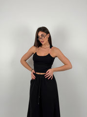 Top con bretelline in silicone trasparente, tessuto a costine strette