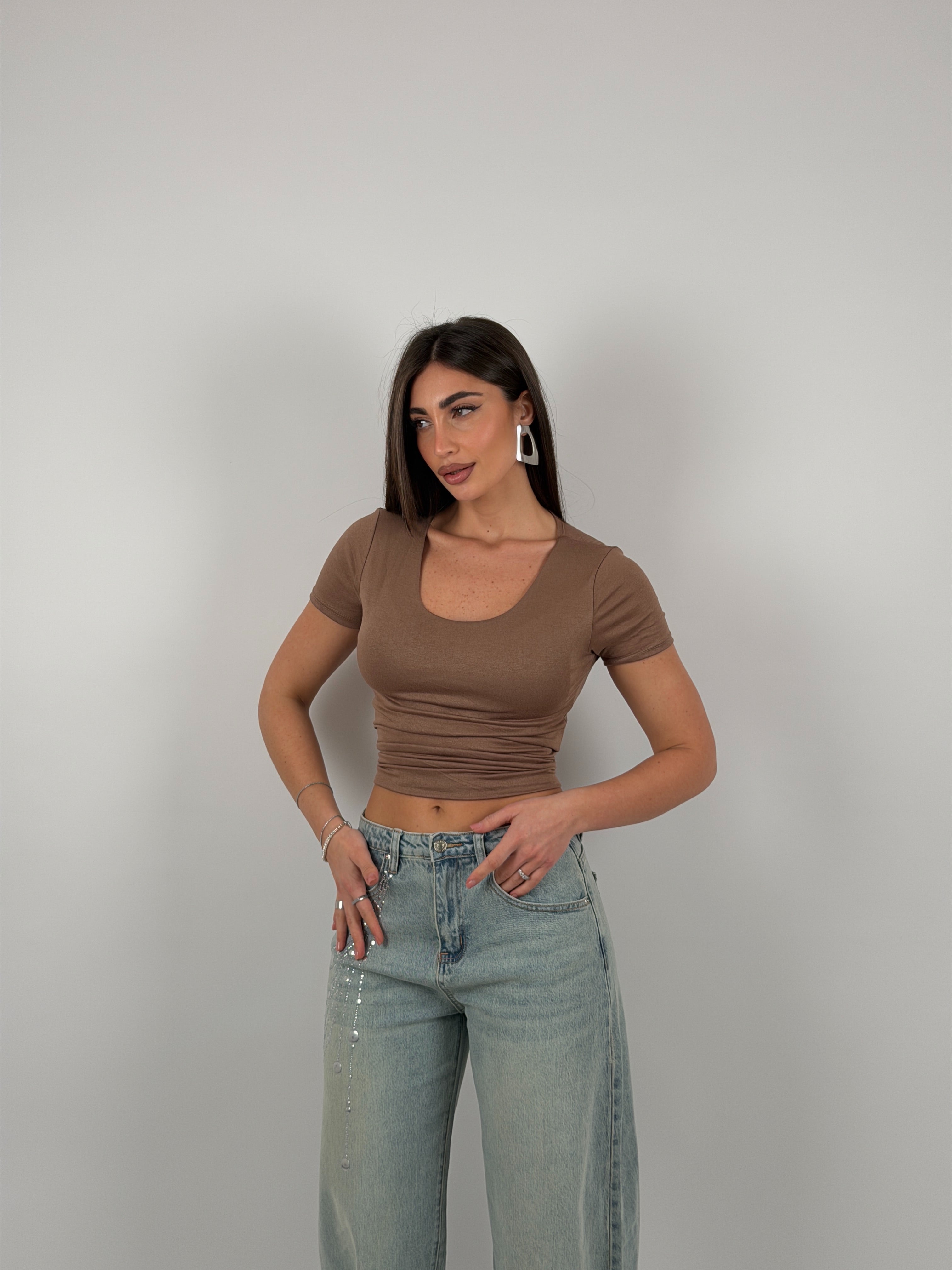 Maglia semivelata con scollo tondo e mezza manica