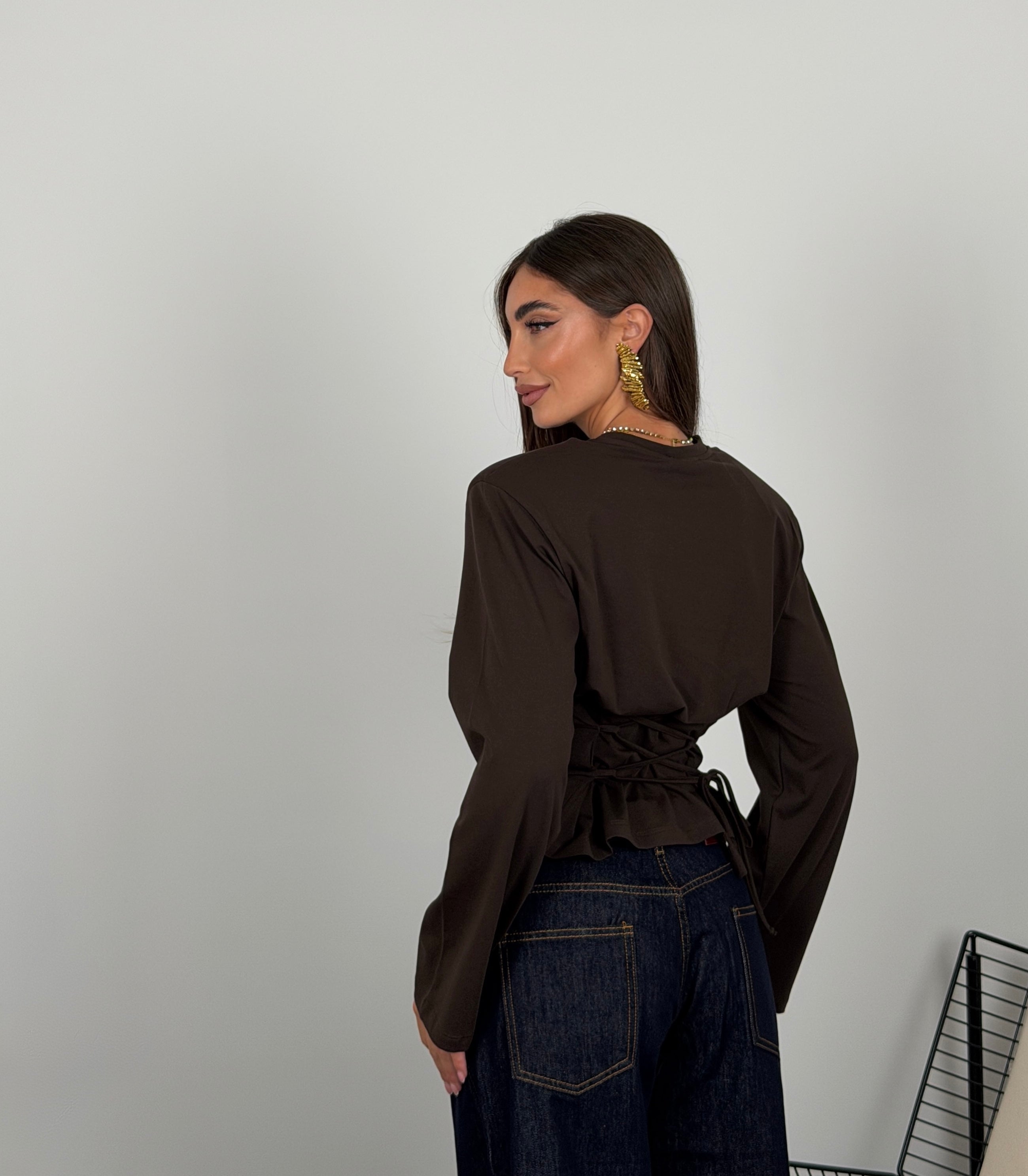 Maglia regolabile sul retro