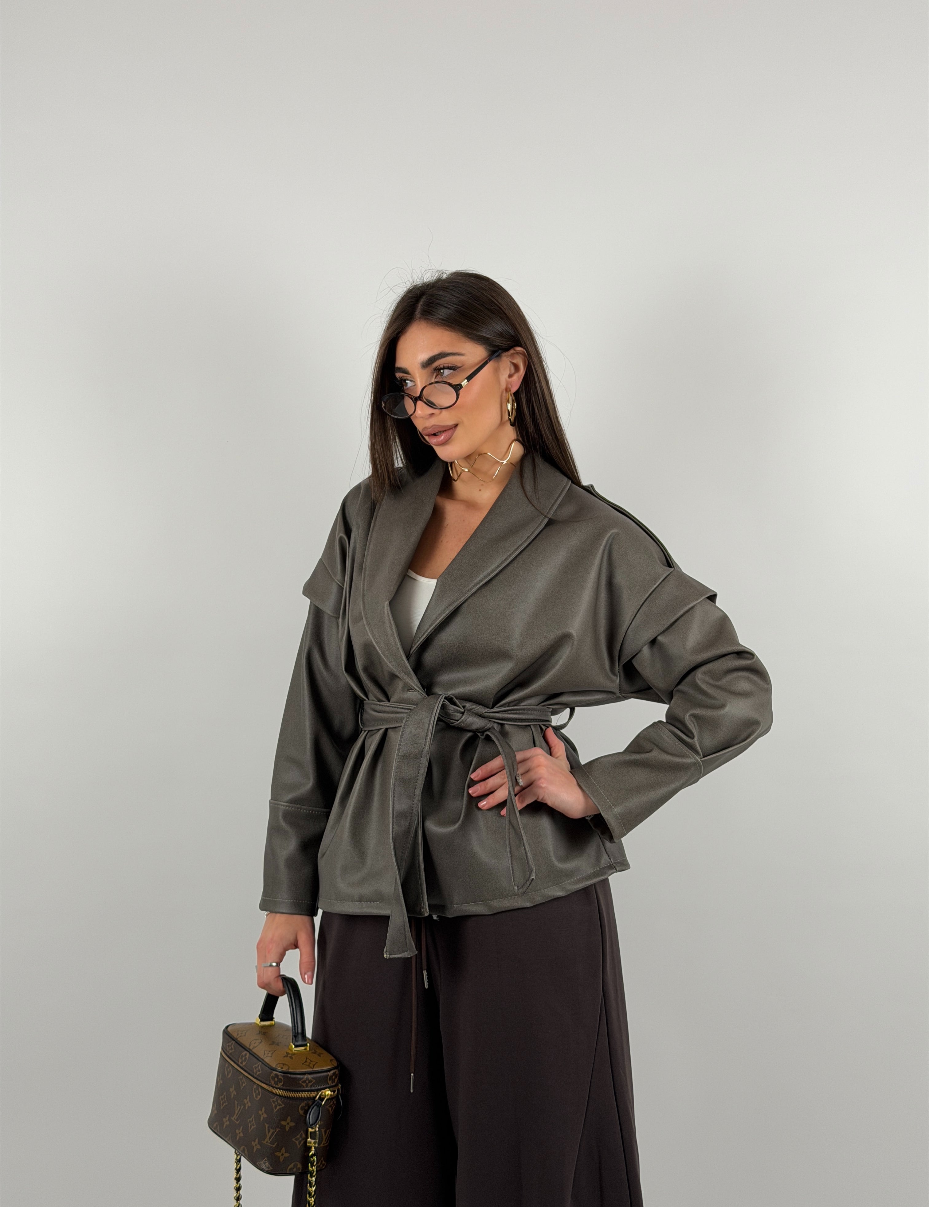 Giacca trench in ecopelle con cintura in vita