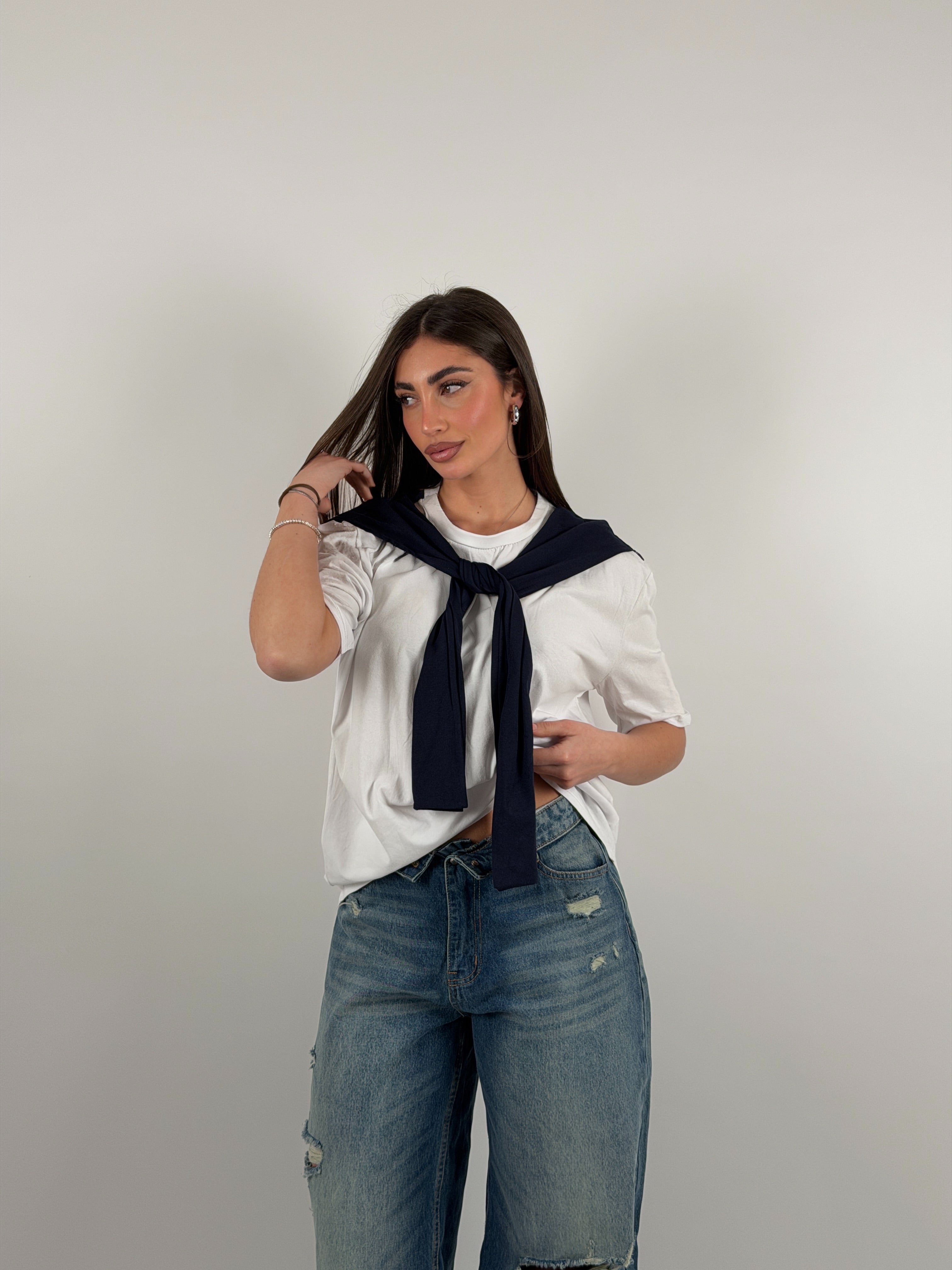 Maglia con maniche che si incrociano