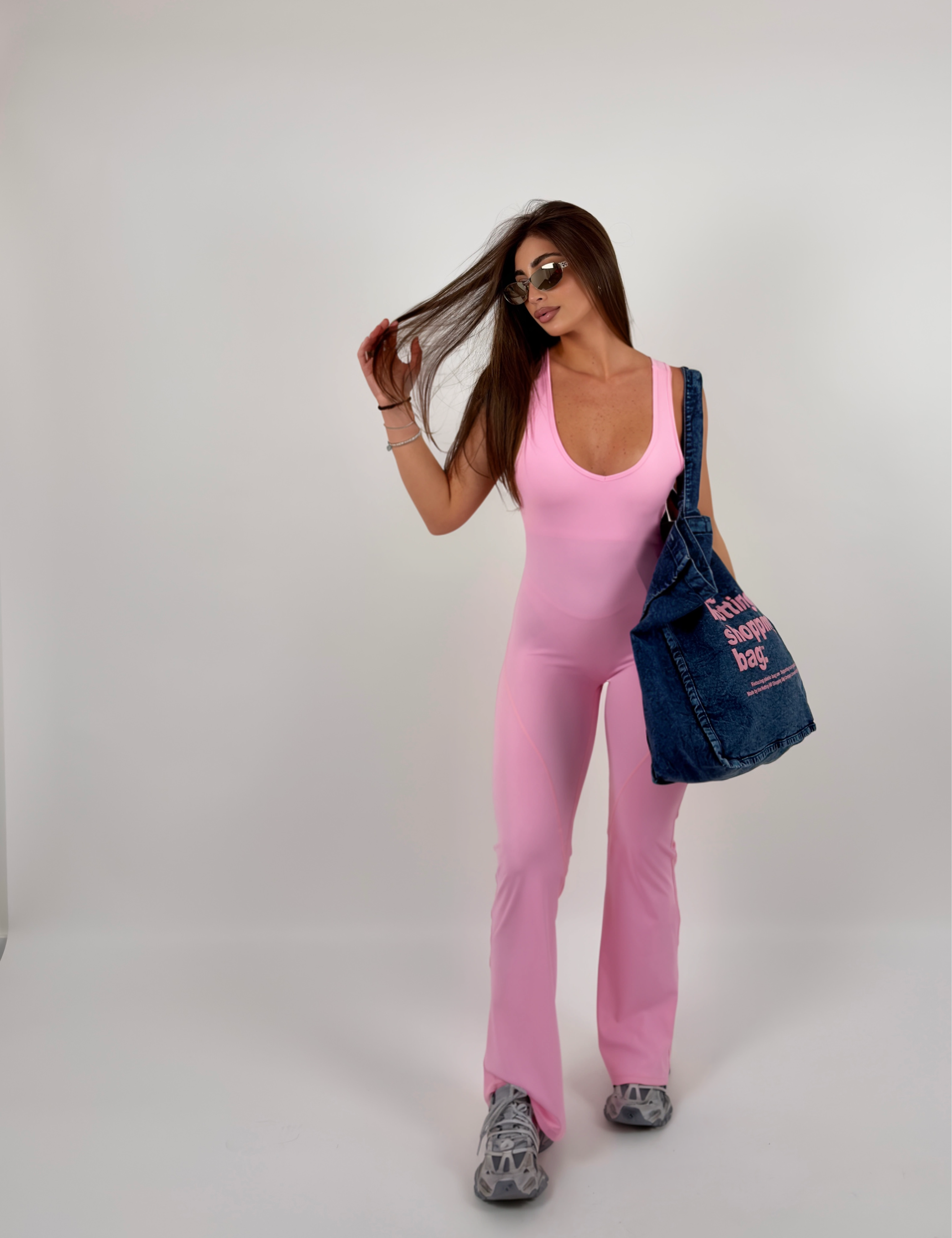 Tuta in lycra modellante, con schiena scoperta