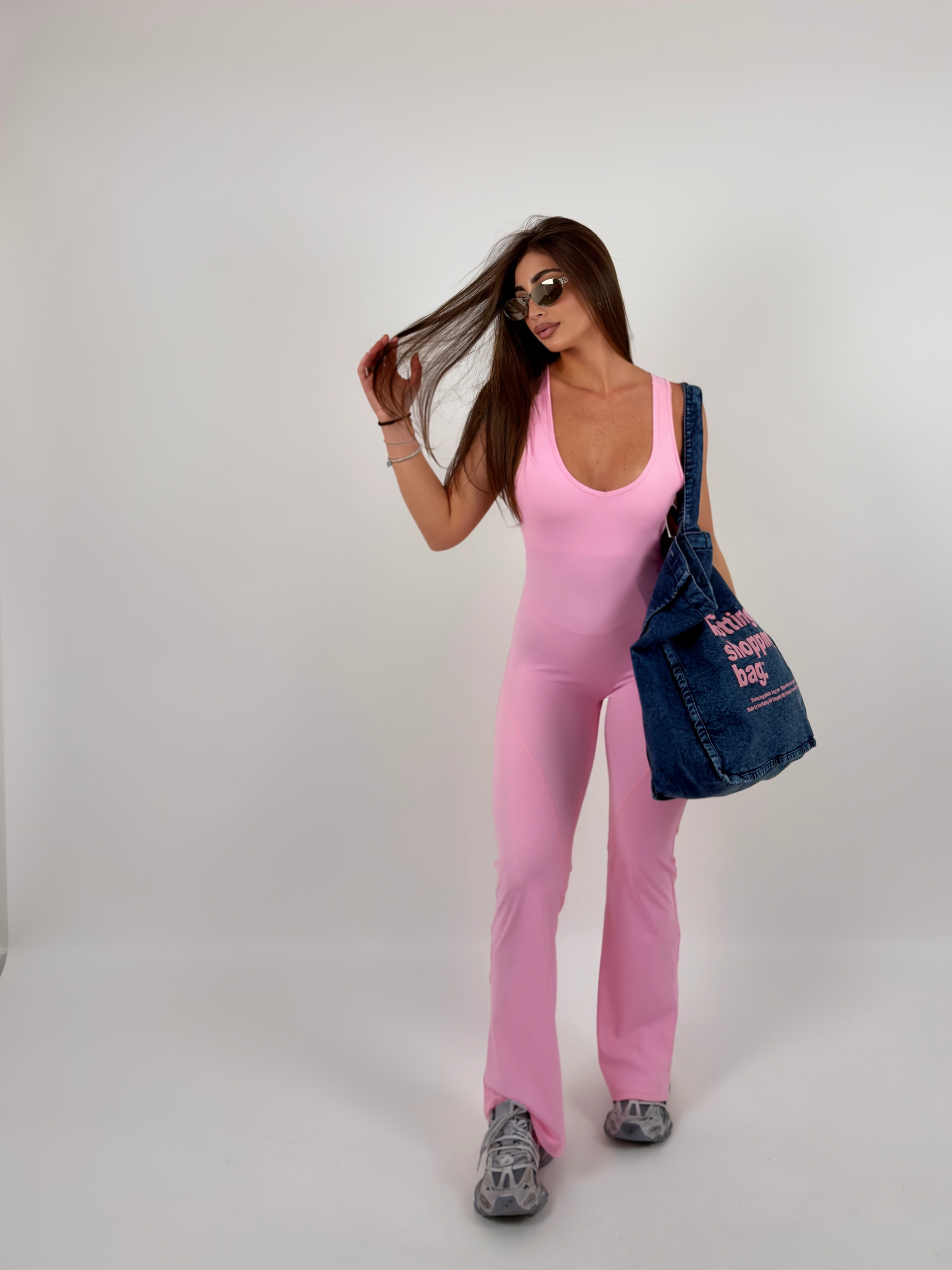 Tuta in lycra modellante, con schiena scoperta