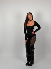 Tuta con gamba merletto