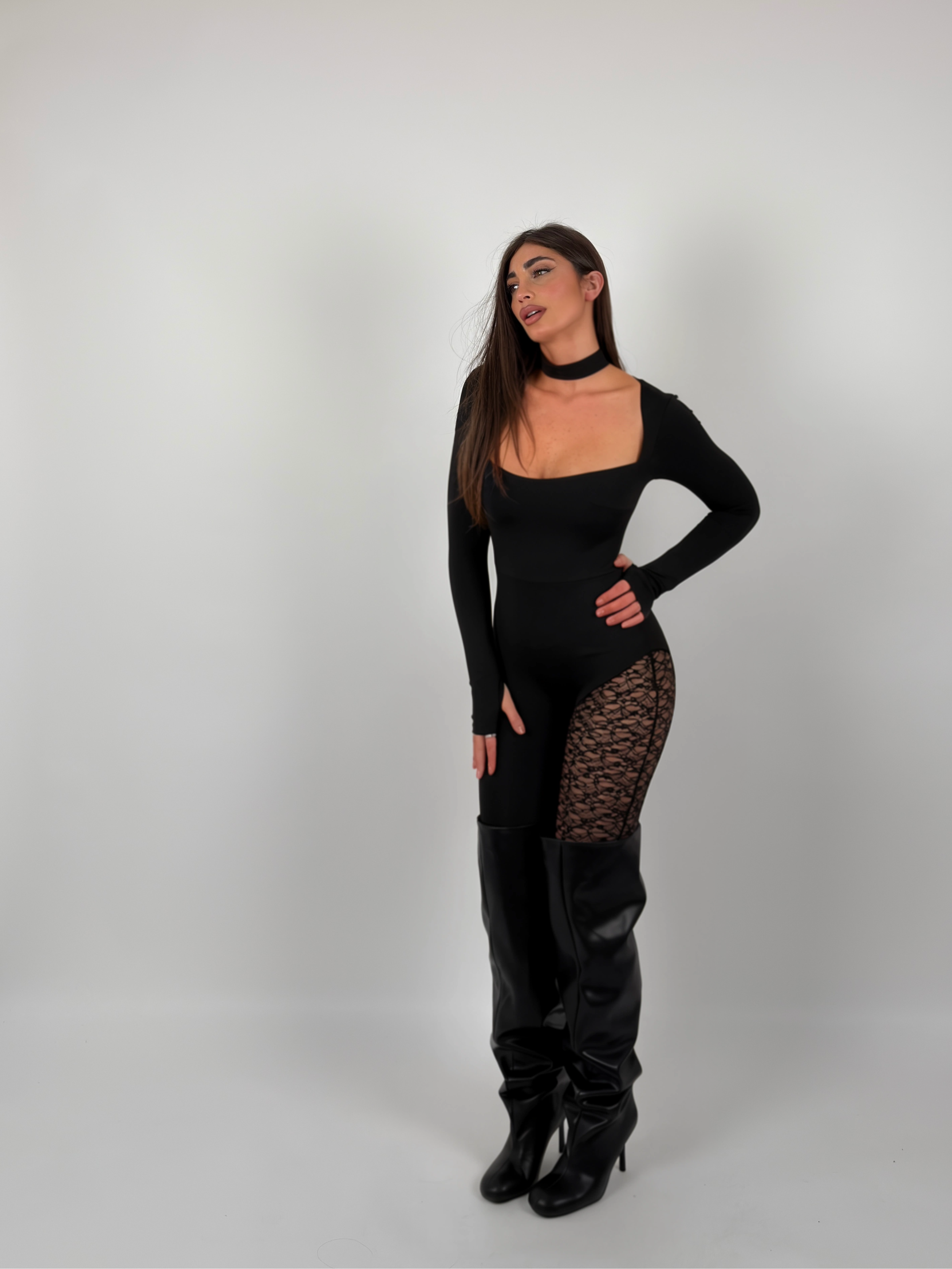 Tuta con gamba merletto