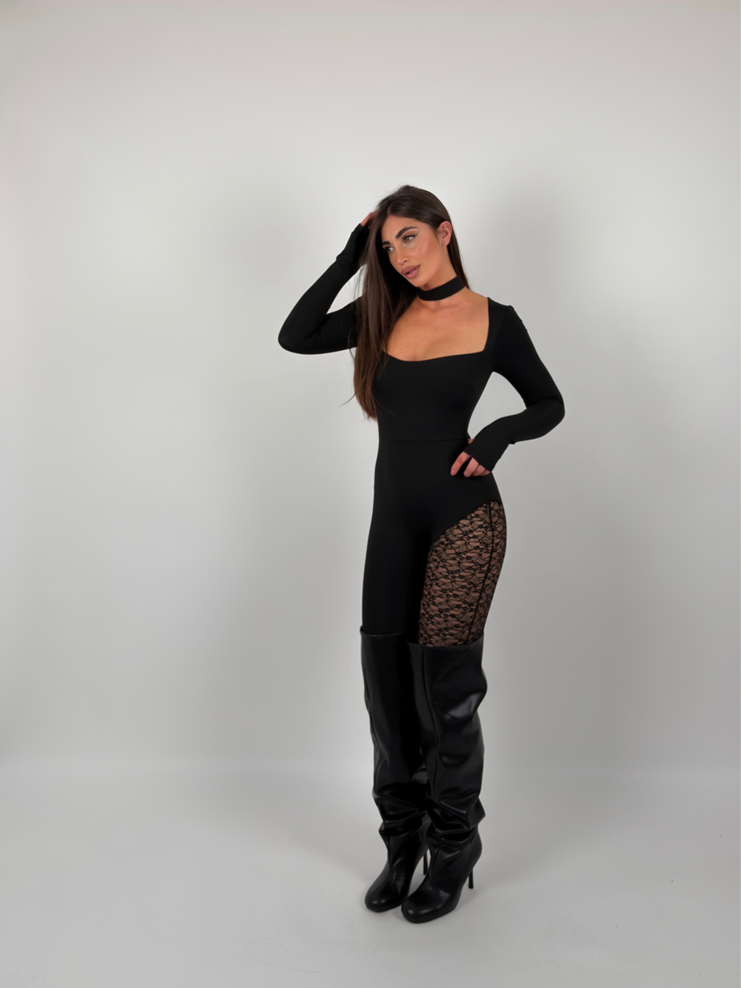 Tuta con gamba merletto